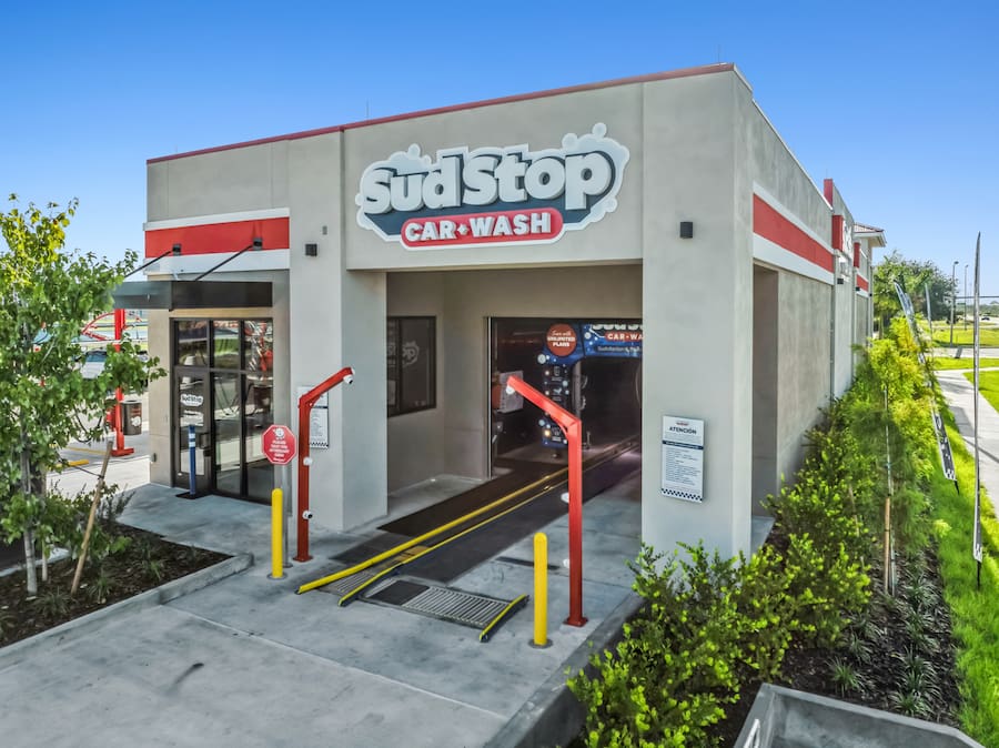 Entrance to express car wash tunnel at sud stop car wash, 26480 Jones Loop Rd, Punta Gorda, FL 3395