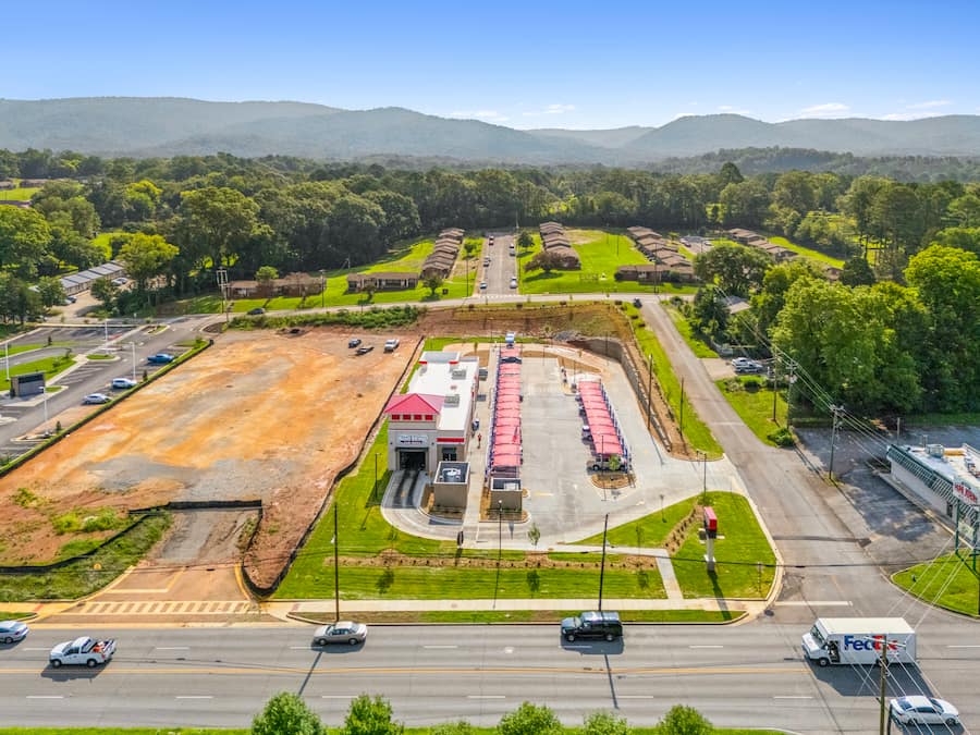 drone photo along pelham road of neighborhood around Sud Stop Car Wash 620 Pelham Rd S, Jacksonville, AL 36265
