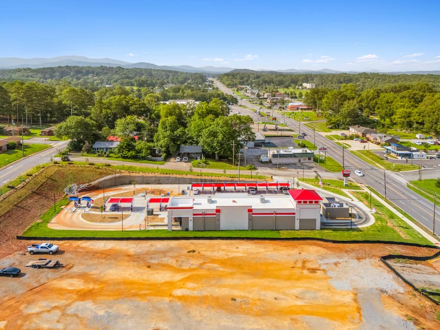drone photo along pelham road of neighborhood around Sud Stop Car Wash 620 Pelham Rd S, Jacksonville, AL 36265